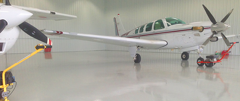 Chemical Resistant Top Coats for Aircraft Hangars